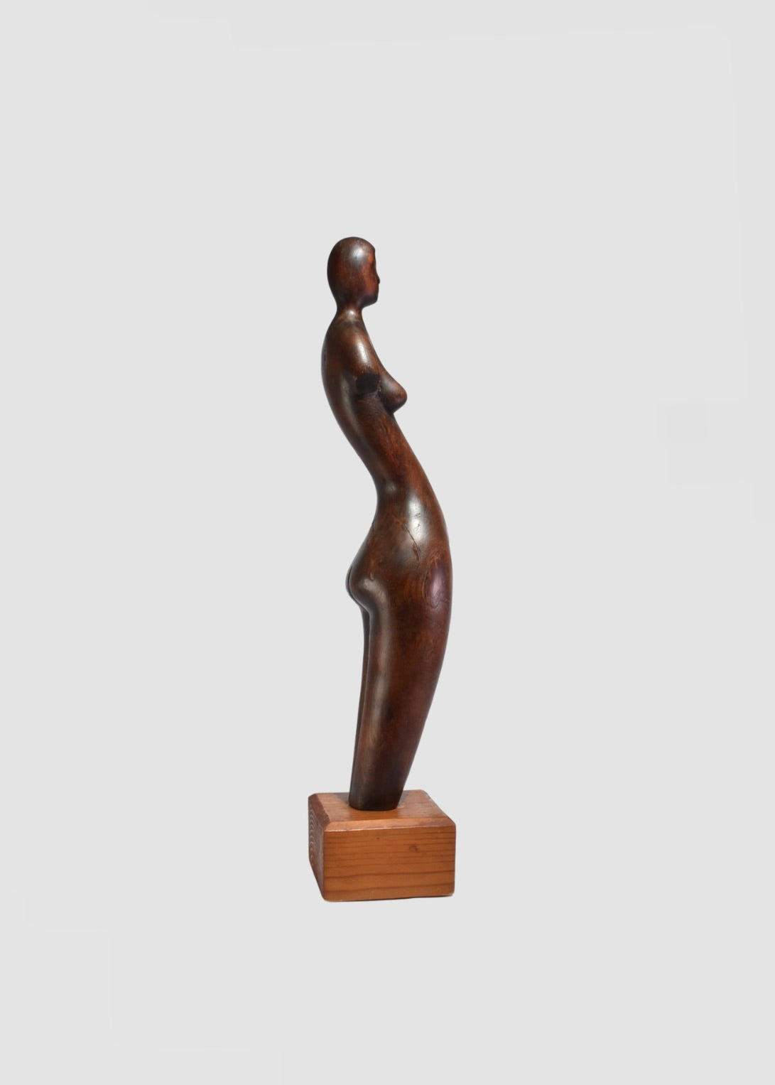 Elongated Wooden Figure Sculpture