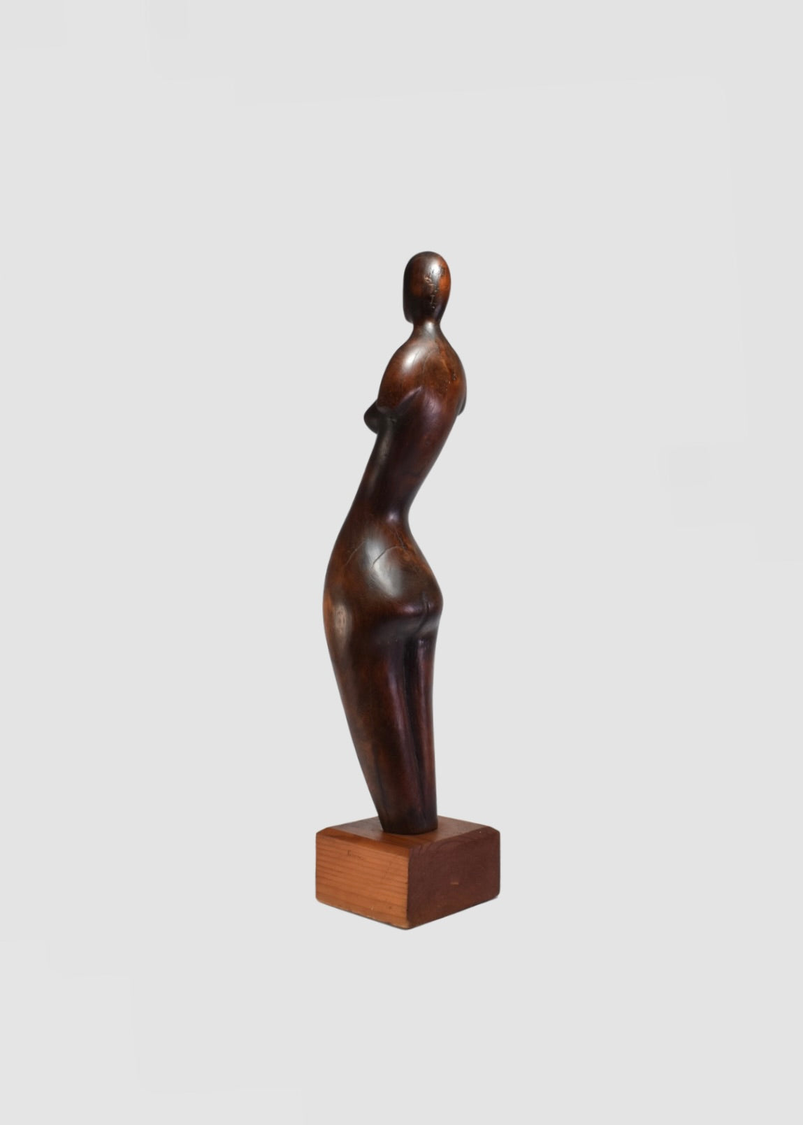 Elongated Wooden Figure Sculpture