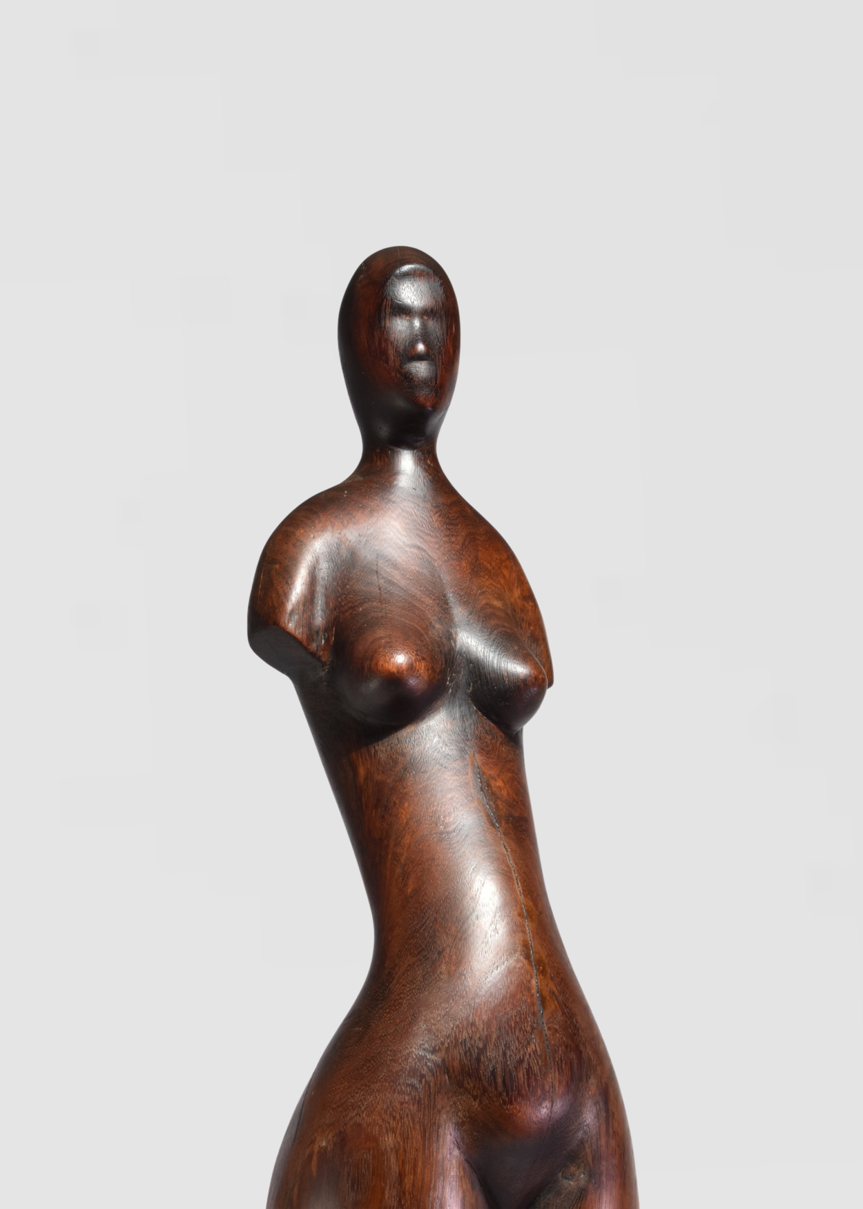 Elongated Wooden Figure Sculpture