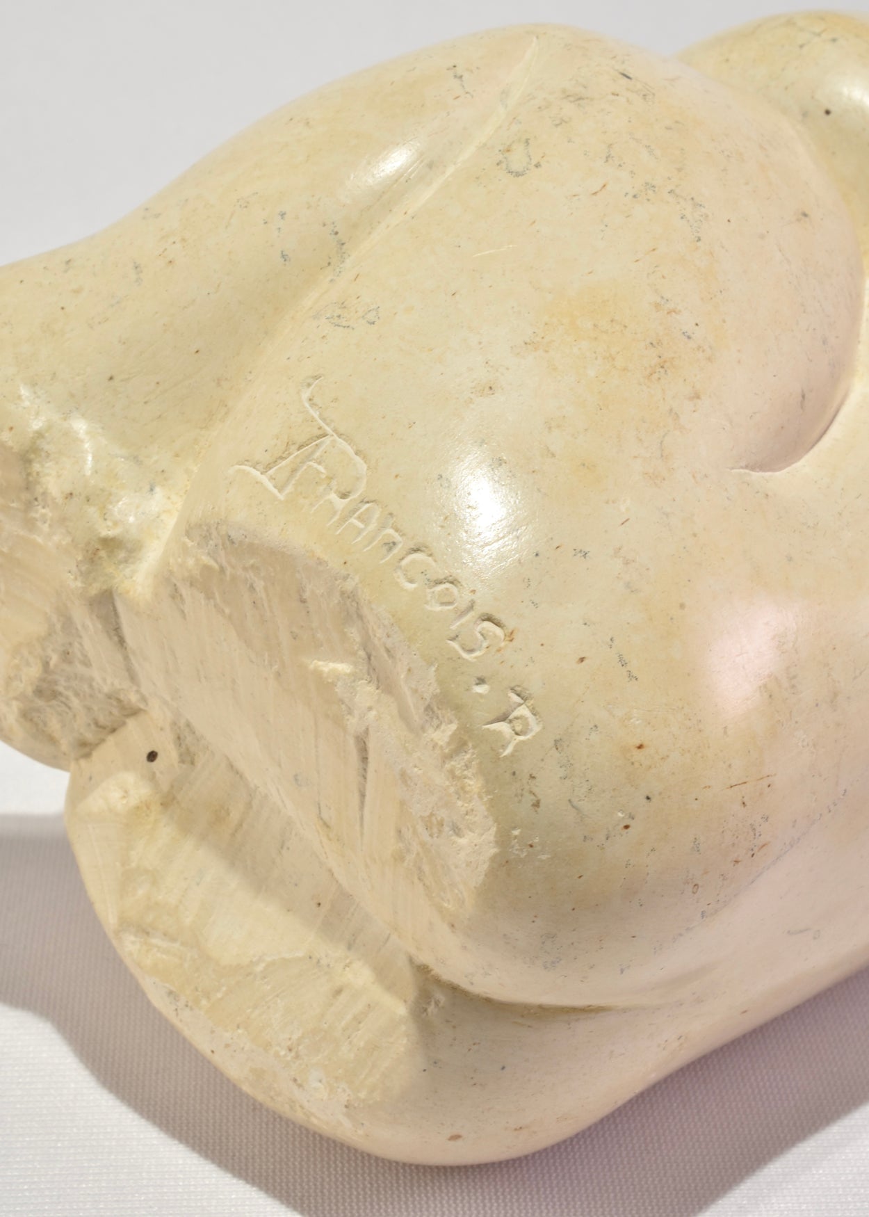 Seated Female Figure Sculpture