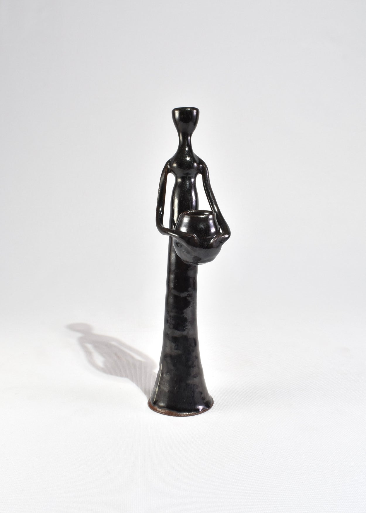 Stylized Figure Candleholder