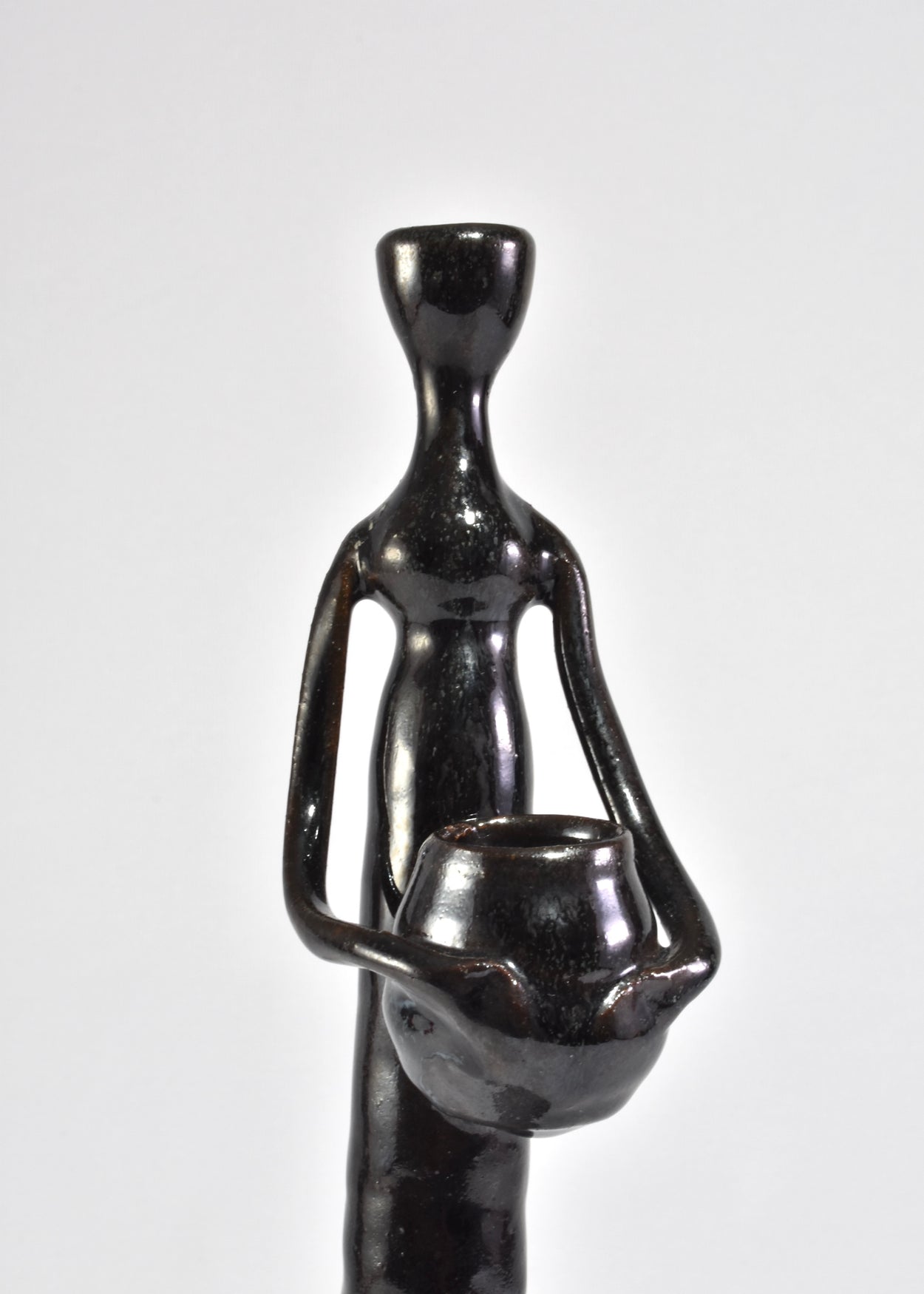 Stylized Figure Candleholder