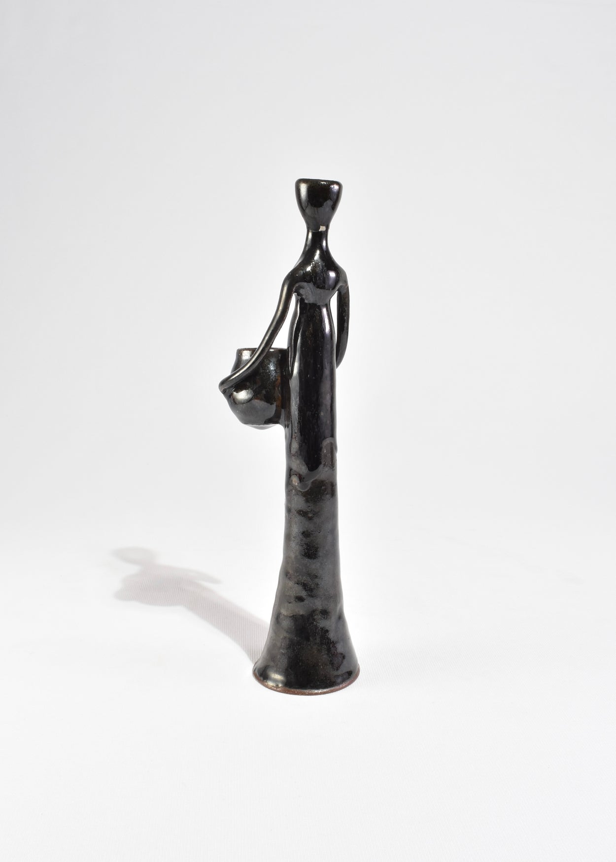 Stylized Figure Candleholder