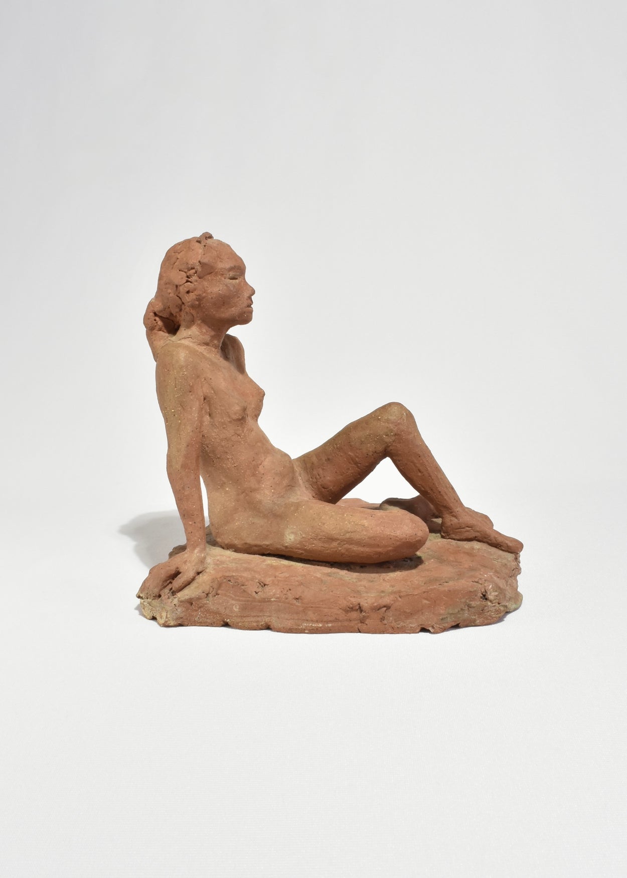 Seated Figure Sculpture