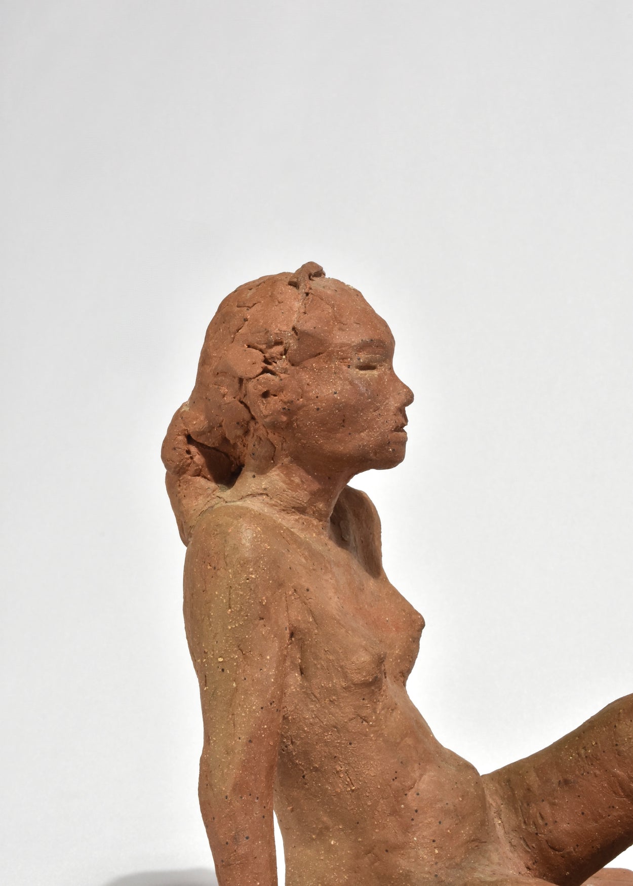 Seated Figure Sculpture