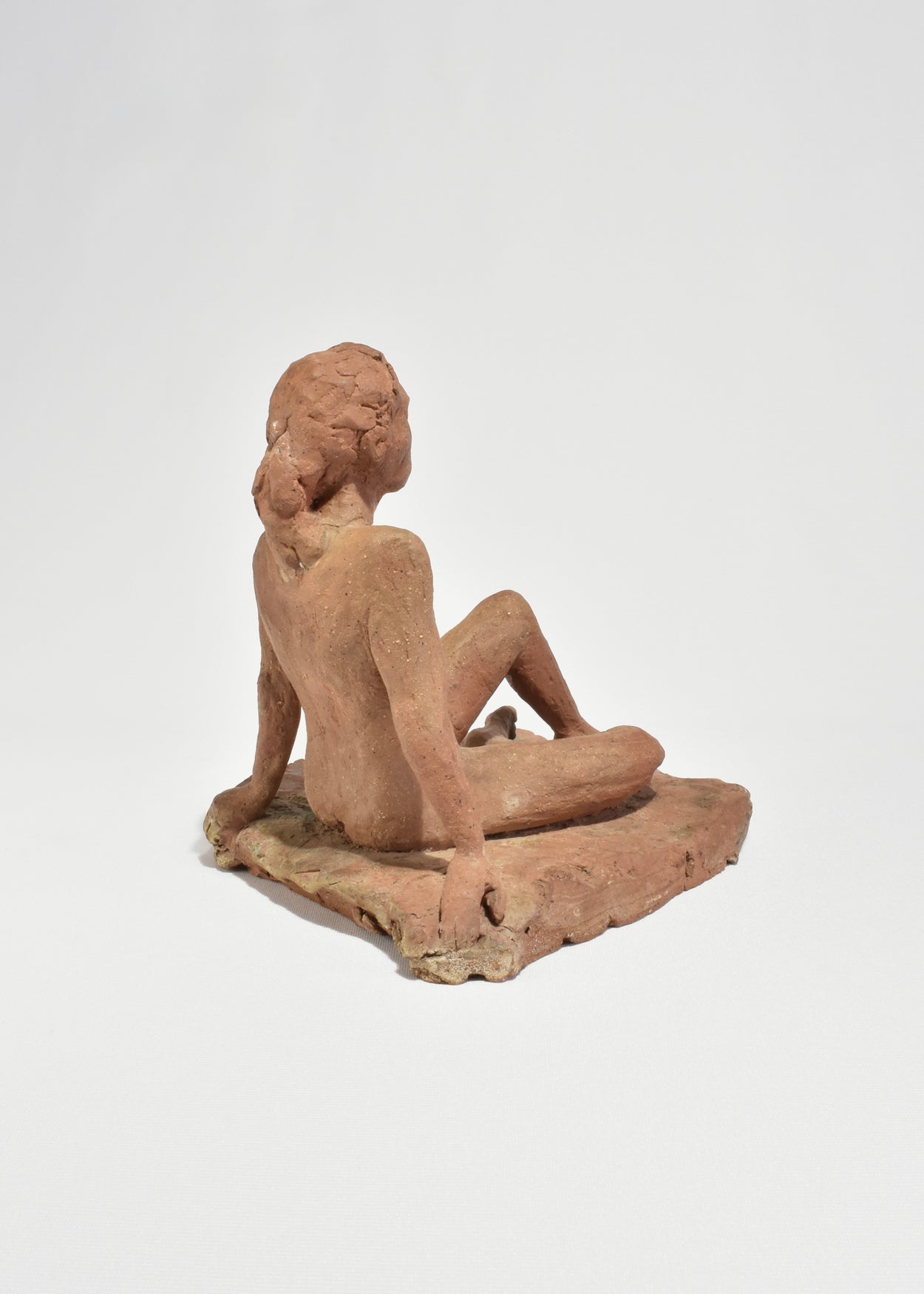Seated Figure Sculpture