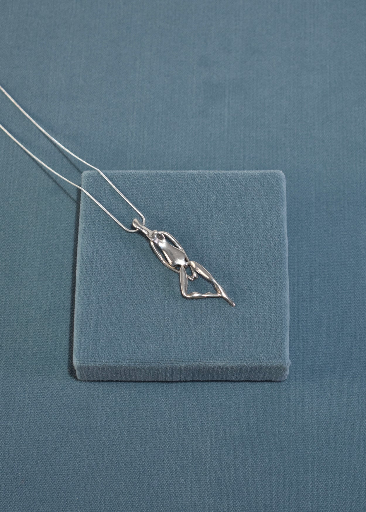 Kinetic Figural Pendant Necklace