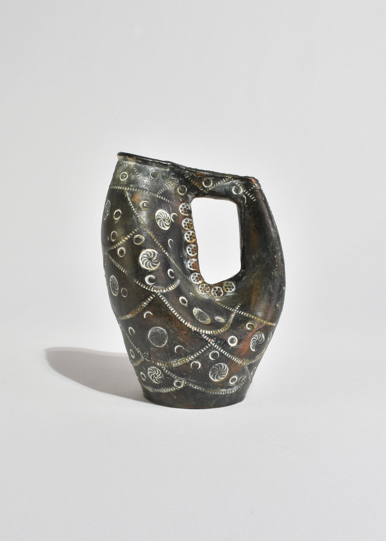 Hand-Carved Arched Vessel