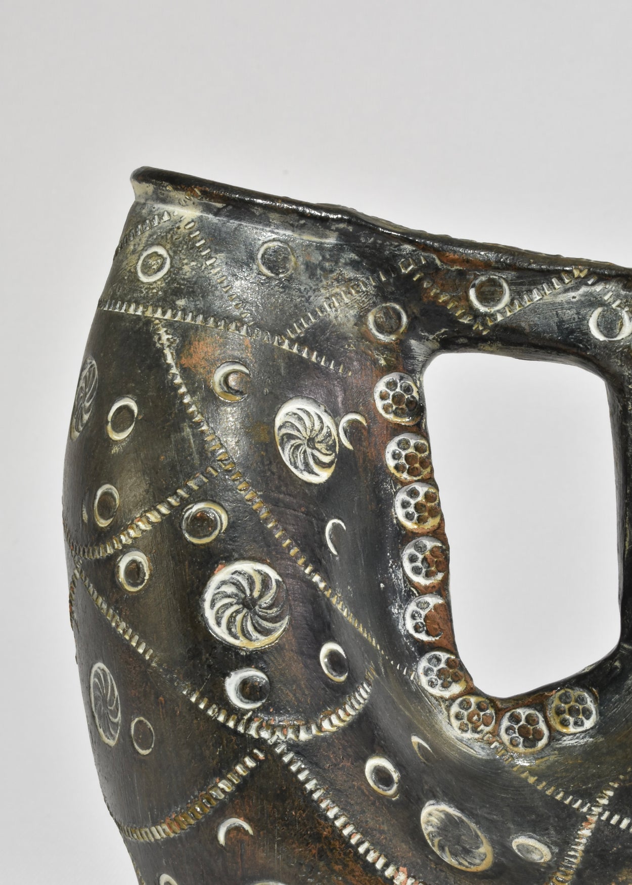 Hand-Carved Arched Vessel