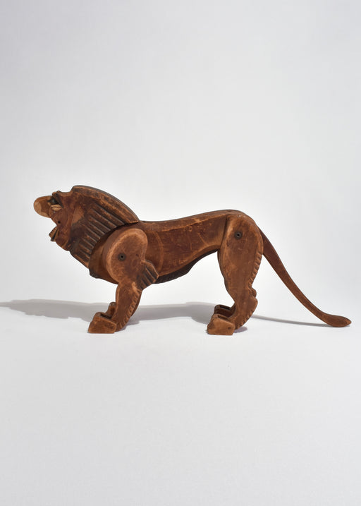 Hand-Carved Articulated Lion Sculpture