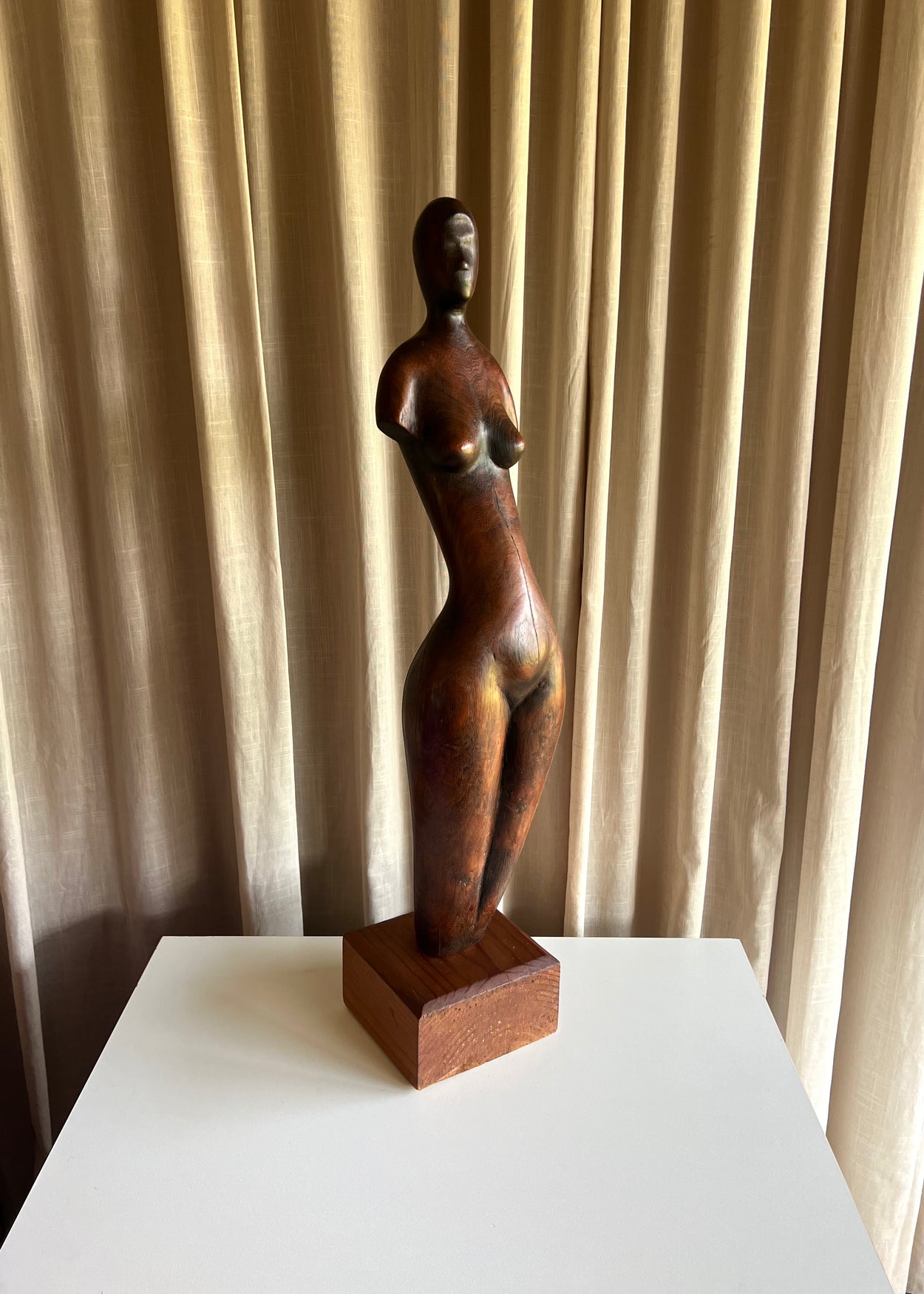 Elongated Wooden Figure Sculpture